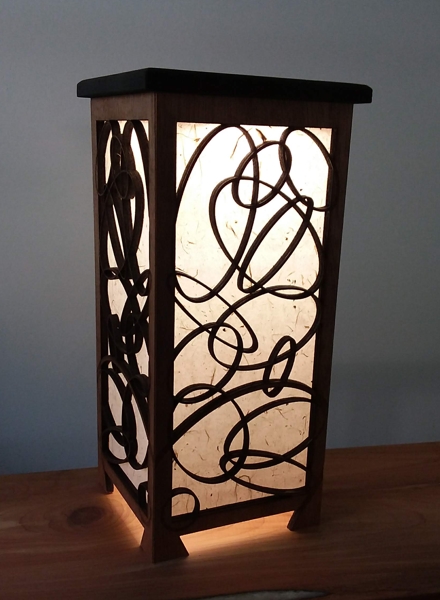 Shoji lamp with overlapping ellipses design